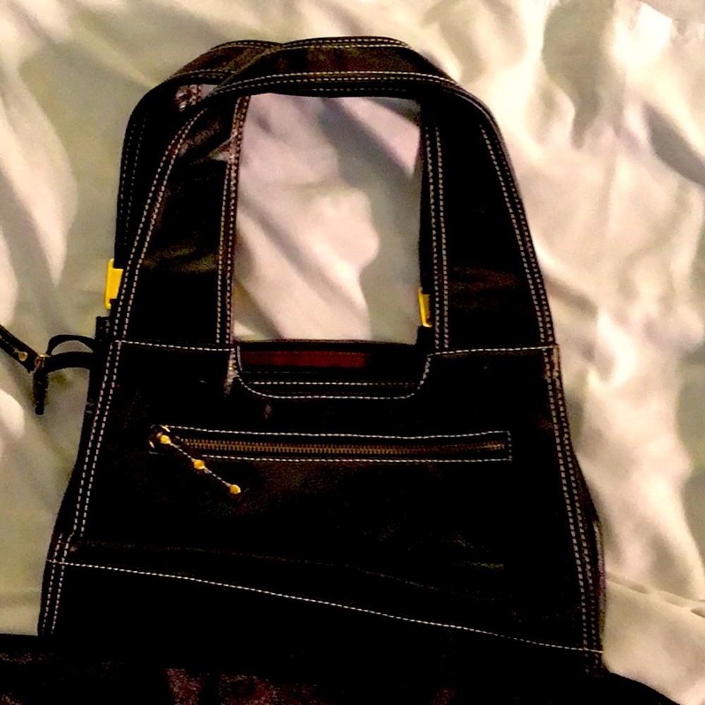 Med black shoulder bag outside zip brown inside